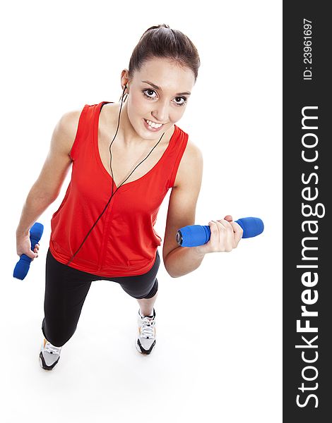 Young Fit Woman Exercising With Weights