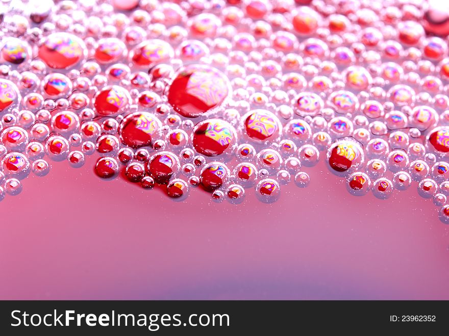 Bubbles in glass with wine