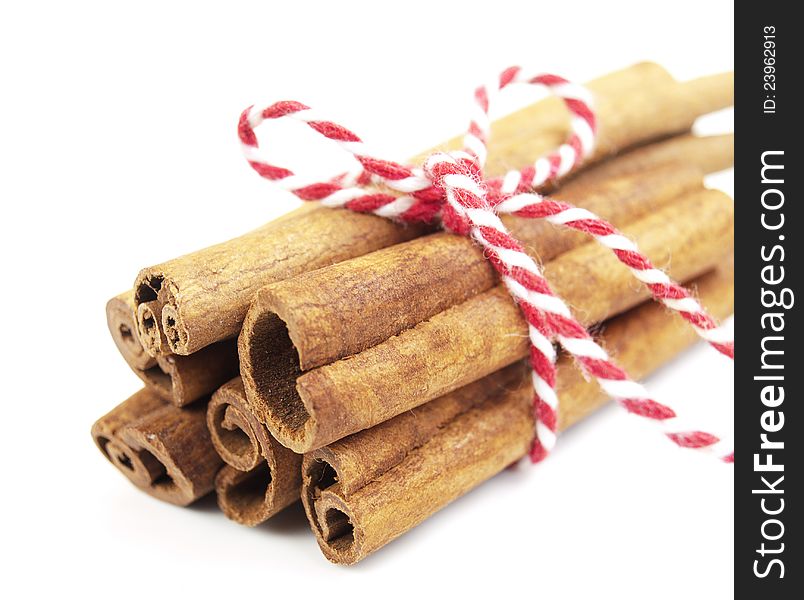 Cinnamon sticks bunch on a white background