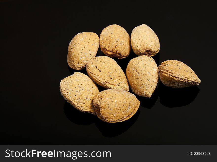 Almonds On Black Background