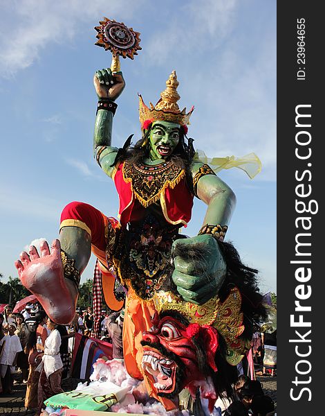 a statue of ogoh-ogoh who are following the ogoh-ogoh parade in Jakarta, the event was held the day before Nyepi. Ogoh-ogoh are statues built for the Ngrupuk parade. Ogoh-ogoh normally have form of mythological beings, mostly demons. As with many creative endeavours based on Balinese Hinduism, the creation of Ogoh-ogoh represents spiritual aims inspired by Hindu philosophy.