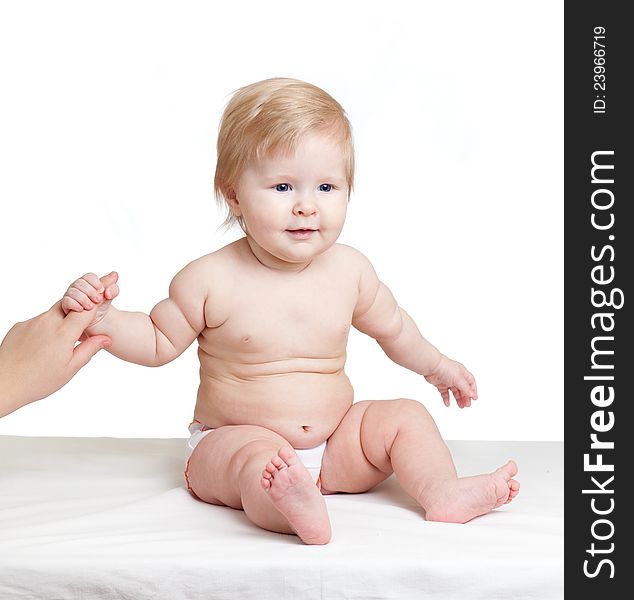 Cute baby girl holding or leaning mother s finger