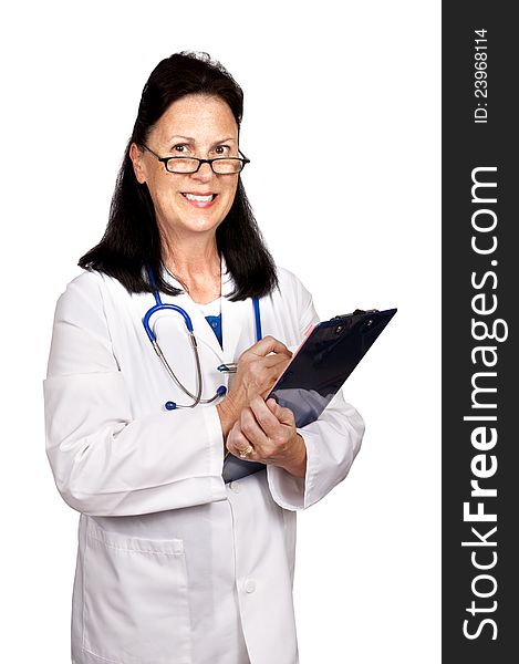 Picture of a female mature doctor smiling holding clipboard.