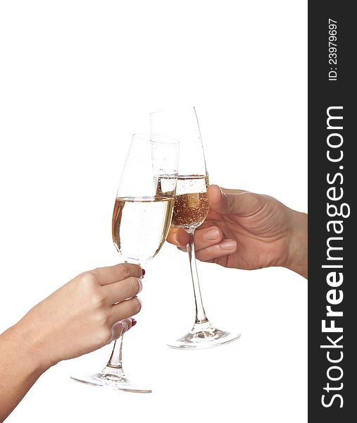 Glasses of champagne  in hands on white  background
