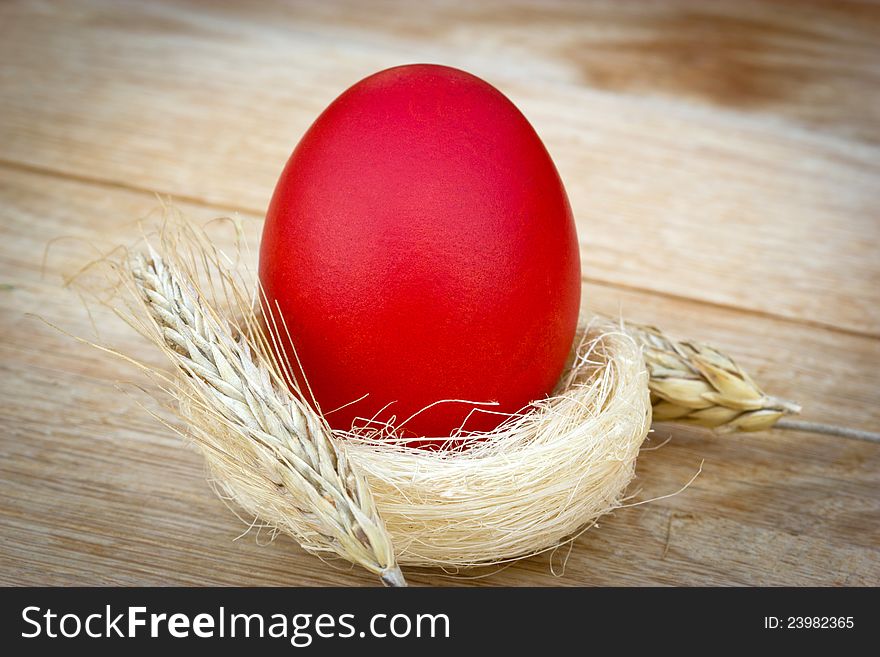 Red Easter egg on the table