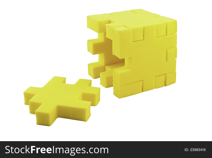 Unfinished jigsaw cube puzzle isolated on white background