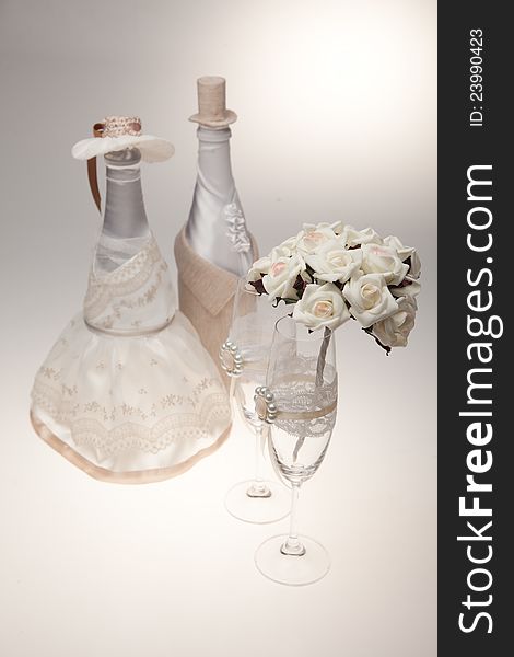 Bottle, decorated as a bride and groom. For the wedding table.