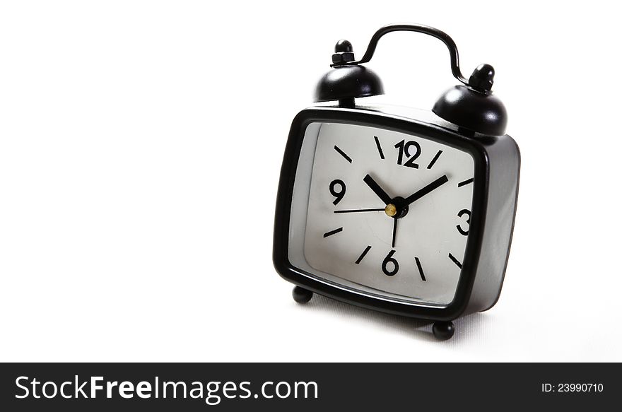 Black clock on white background. Black clock on white background.