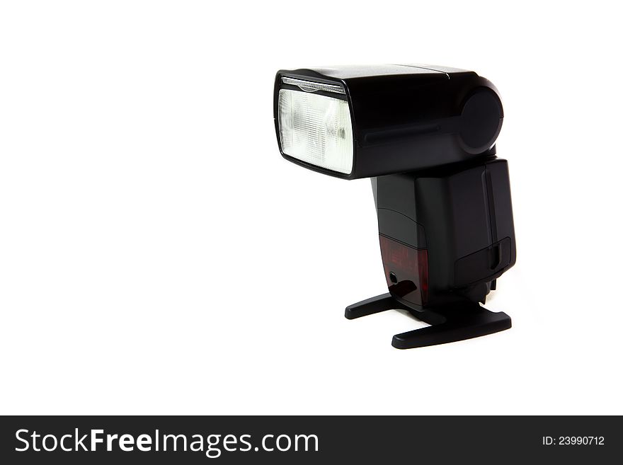 Black Camera flash on white background.