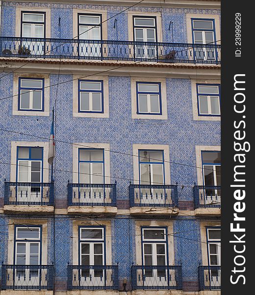Lisbon building covered in blue and white tiles. Lisbon building covered in blue and white tiles