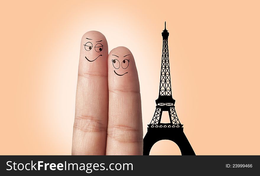 A finger couple dream to travel in Europe France Paris