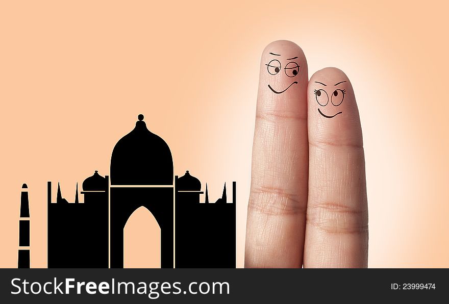 A finger couple dream to travel in India