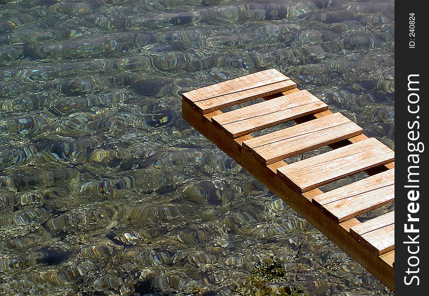 Gangway over a crystal clear water at the Korkula island (Croatia). Gangway over a crystal clear water at the Korkula island (Croatia)