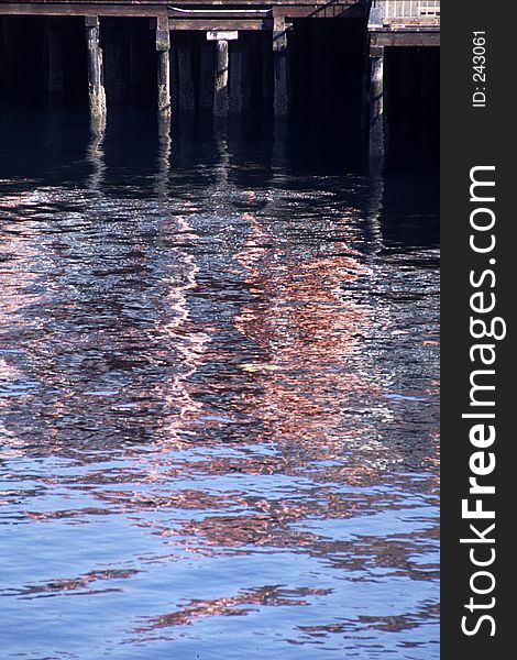 Reflections of pier structure in water. Reflections of pier structure in water