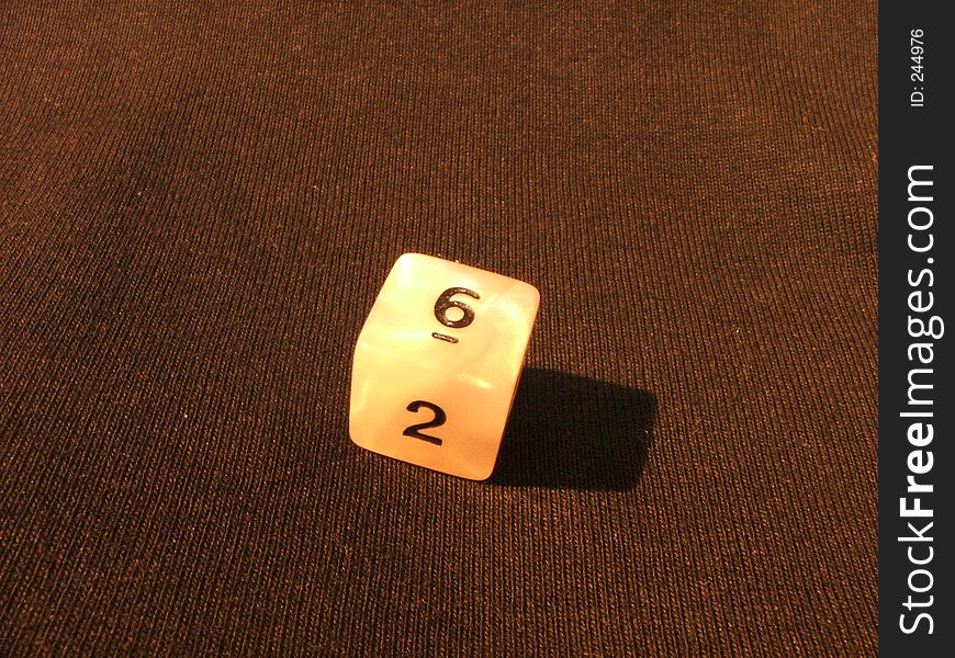 A single dice on the table (II version). A single dice on the table (II version)