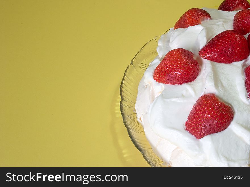 Pavlova, a New Zealand dessert made almost entirely from egg white, with strawberries on top. Pavlova, a New Zealand dessert made almost entirely from egg white, with strawberries on top