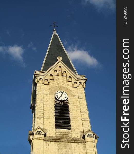 Top of a christian church against blue sky. Top of a christian church against blue sky