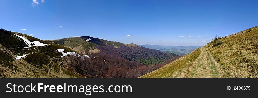 Panoramic picture of mountains in early springtime. Panoramic picture of mountains in early springtime