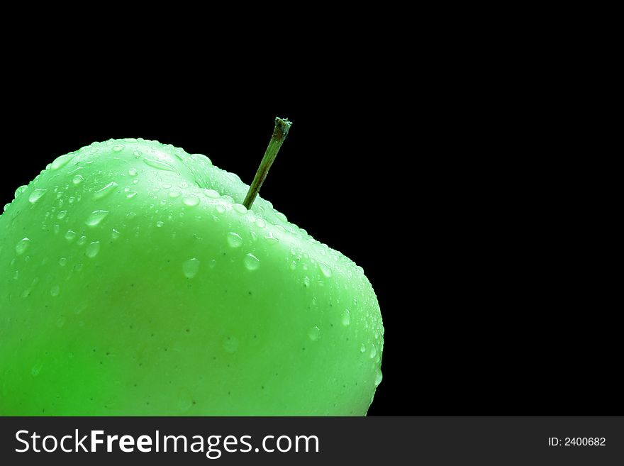 Granny smith apple isolated over a black background