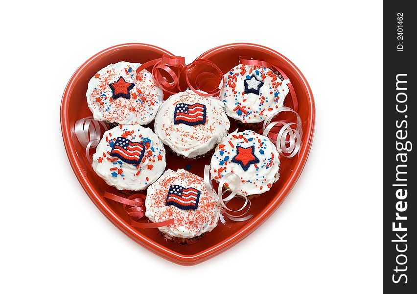 American theme cupcakes in a heart-shaped dish. American theme cupcakes in a heart-shaped dish.