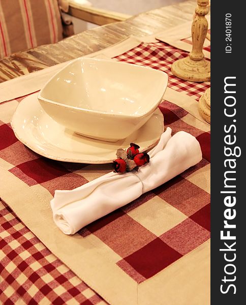 Red and cream decorated table setting
