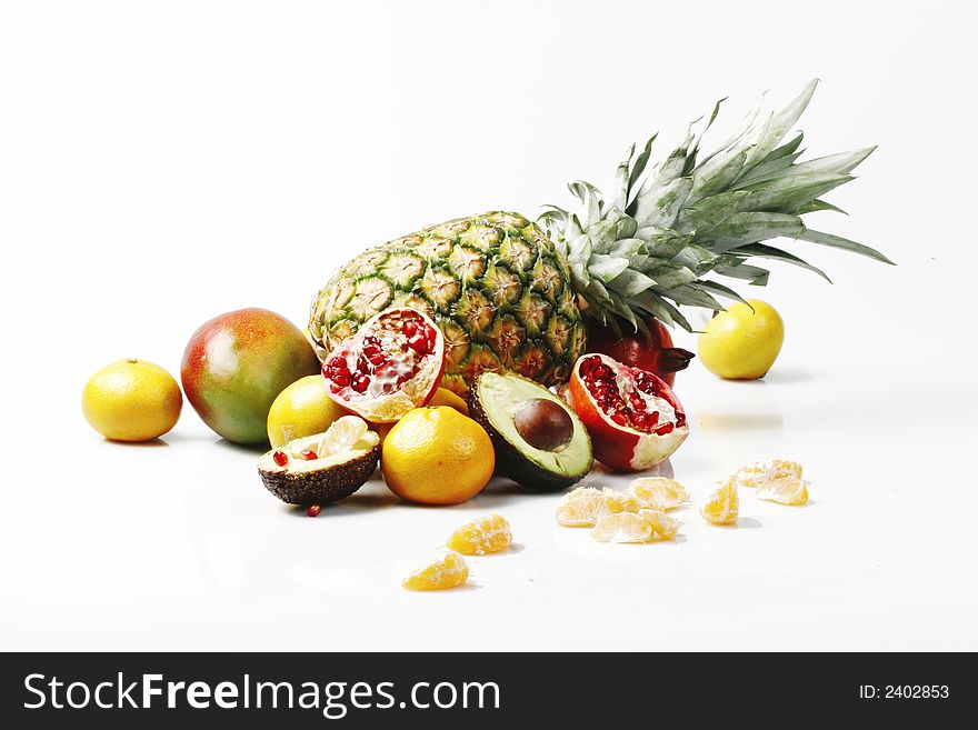 Different fruits on a white background