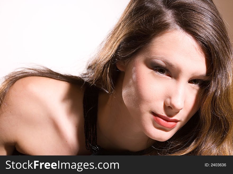 Portrait of a beautiful young woman with intense look. Portrait of a beautiful young woman with intense look