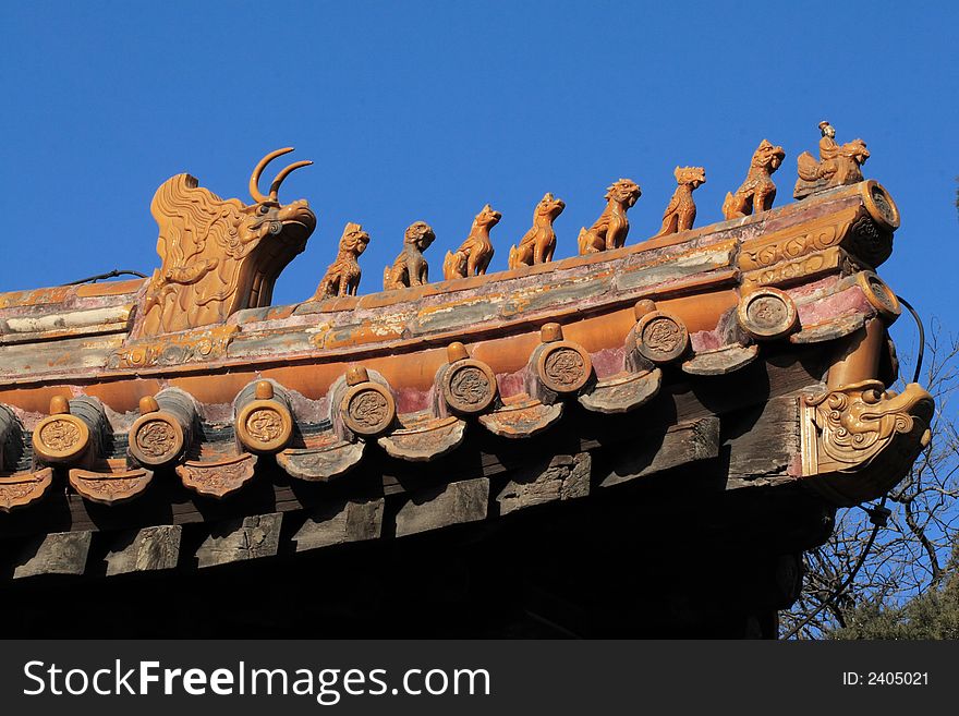 Imperial roof decoration of a building at the Forbidden City