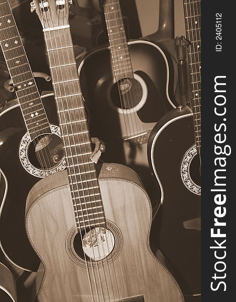 Sepia guitar collection of four instruments