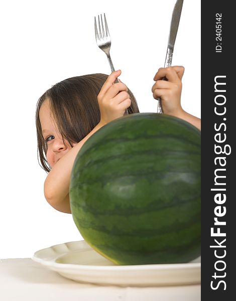 Expressive little girl ready to eat an entire watermelon, isolated over white. Expressive little girl ready to eat an entire watermelon, isolated over white