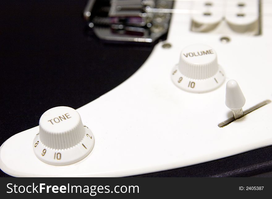 Close-up of Guitar on white background