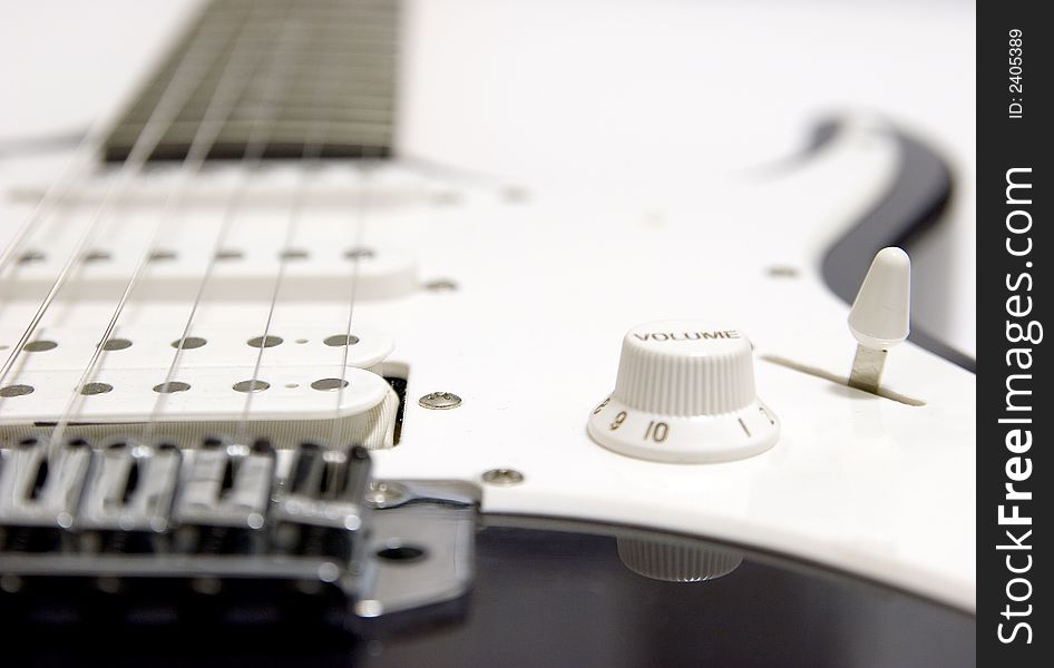Close-up of Guitar on white background