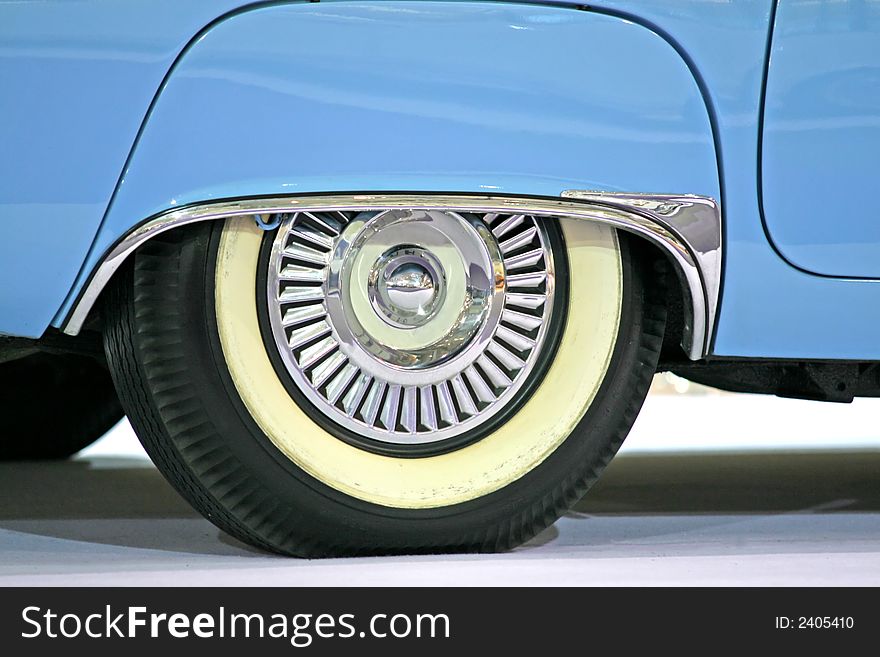 Close up of a wheel of a classic cabriolet car. Close up of a wheel of a classic cabriolet car