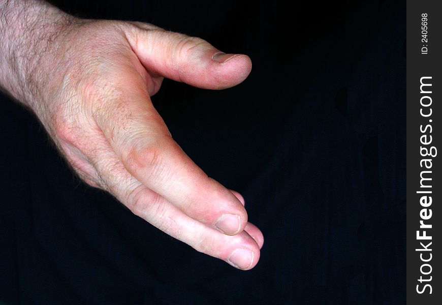 Handshake isolated on black background. Handshake isolated on black background