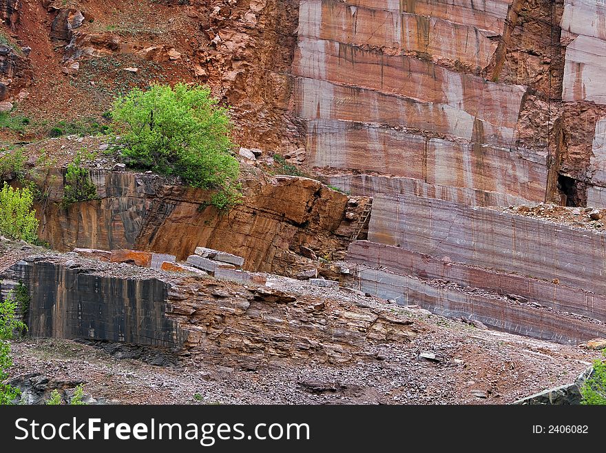 Red and black marble in an abandoned mine. Red and black marble in an abandoned mine