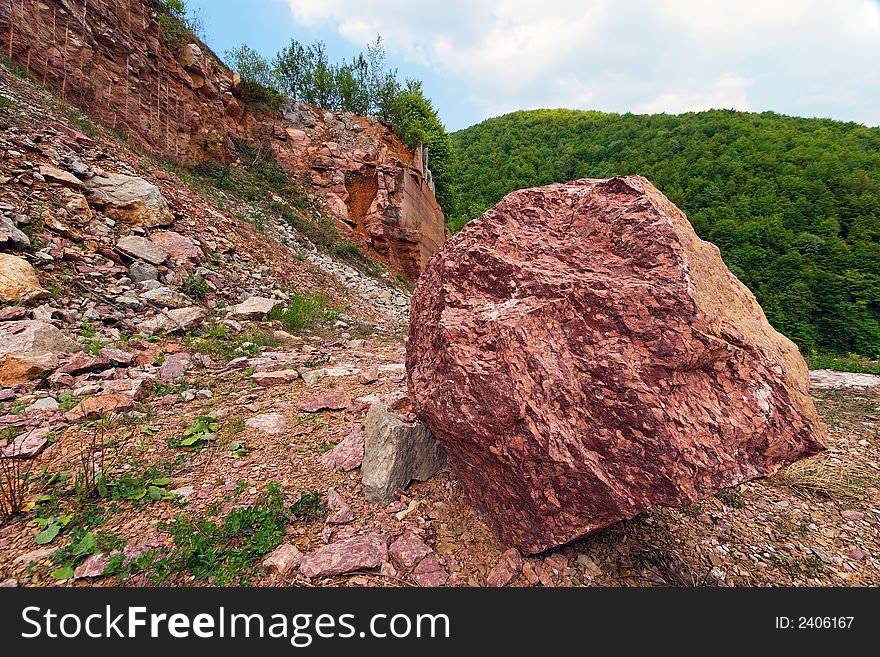 Red and black marble in an abandoned mine. Red and black marble in an abandoned mine