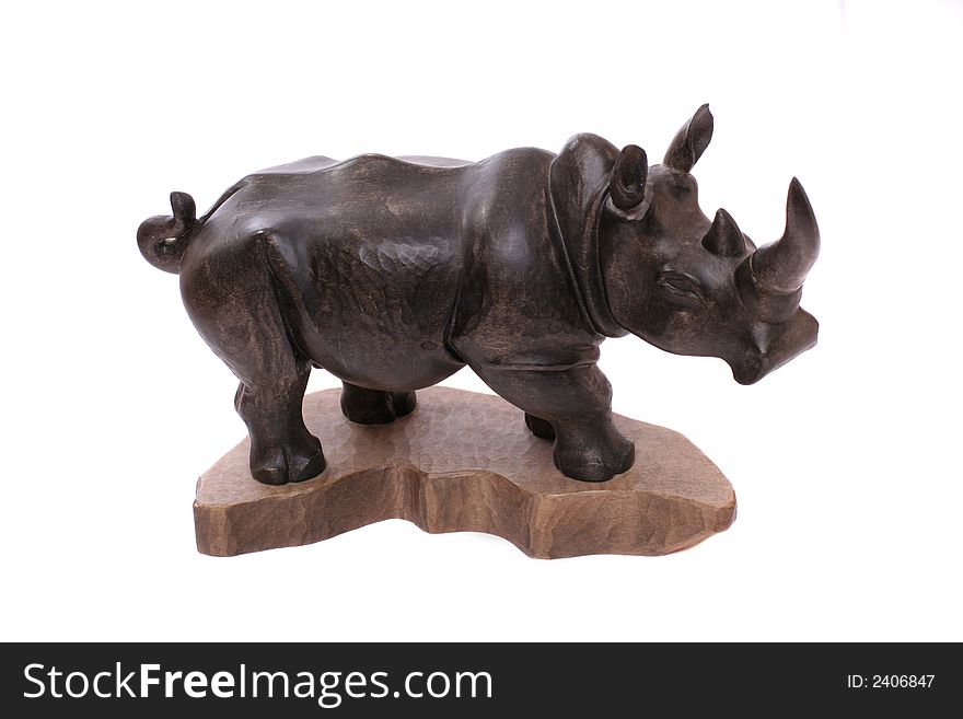 A wooden rhinocerus on white background