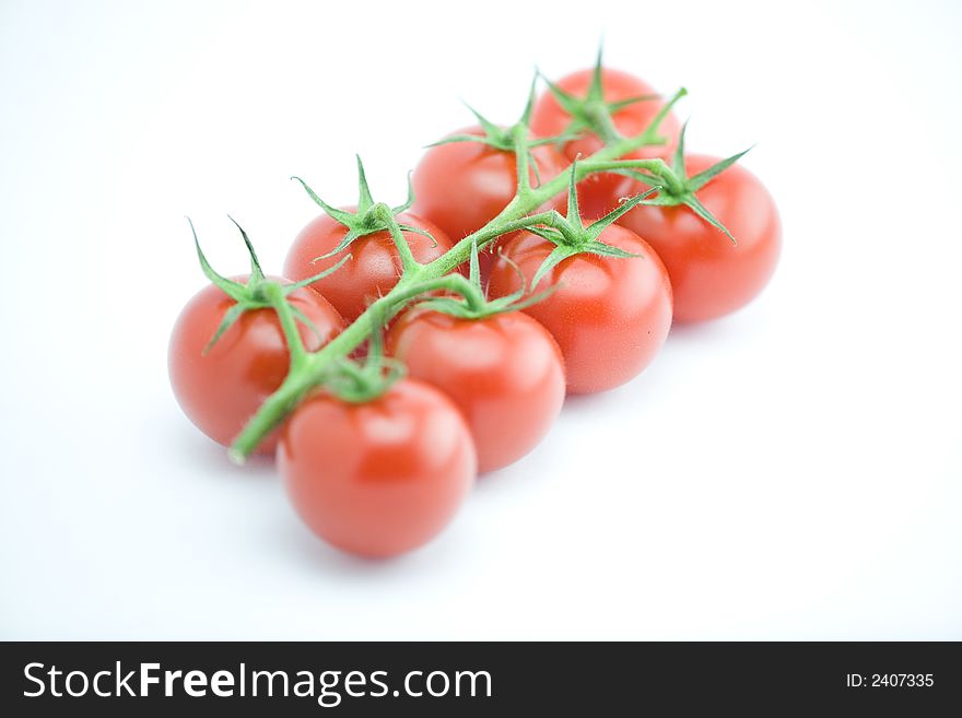Eight red tomatoes isolated on white background. Eight red tomatoes isolated on white background
