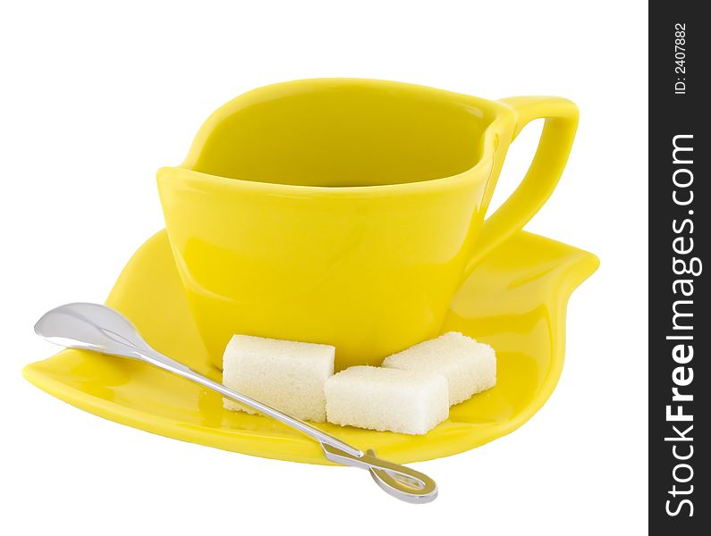 Yellow a tea service with the spoon and sugar. Yellow a tea service with the spoon and sugar