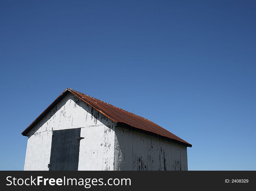 White hut and the blue sky