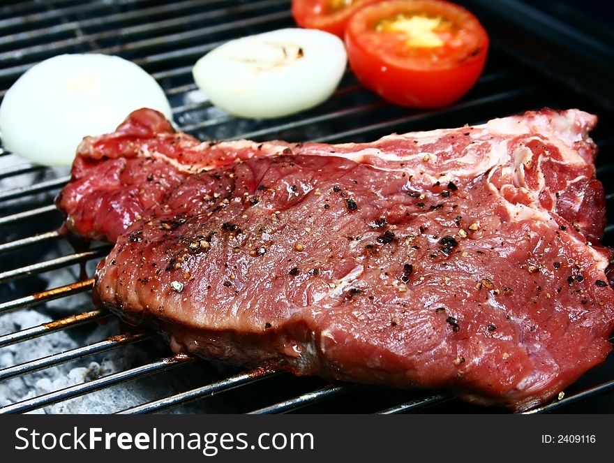 T-bone steak on a grill