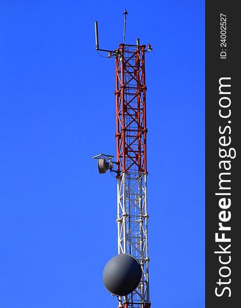 Metallic structure for a tv and radio antenna with blue sky background. Metallic structure for a tv and radio antenna with blue sky background