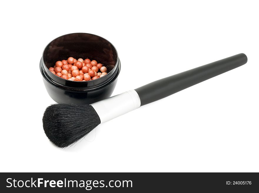 Blush cosmetics powder and makeup brush on white background