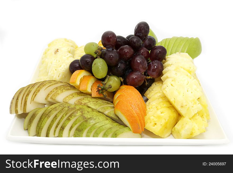 Plate with exotic fruits on white background. Plate with exotic fruits on white background