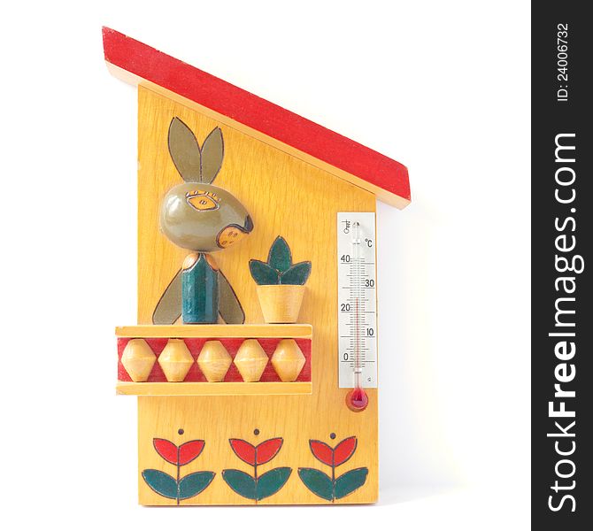 A thermometer decorated with a hare, flowers and other patterns. A thermometer decorated with a hare, flowers and other patterns.