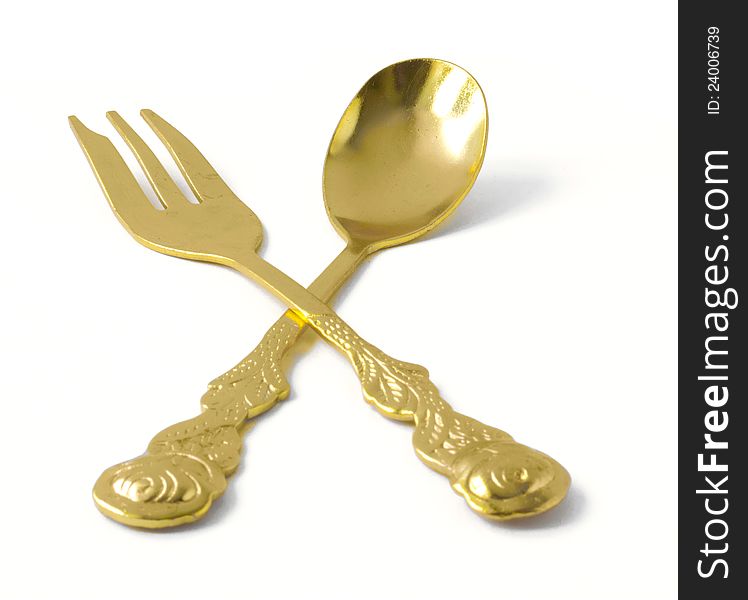 Kitchen utensils represented by the crossed spoon and fork. Kitchen utensils represented by the crossed spoon and fork.