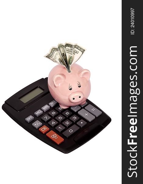 Vertical shot of calculator with piggy bank and hundred dollar bill in slot.  Isolated on white. Vertical shot of calculator with piggy bank and hundred dollar bill in slot.  Isolated on white.