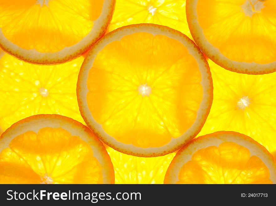 Orange slices background / macro / back-lit