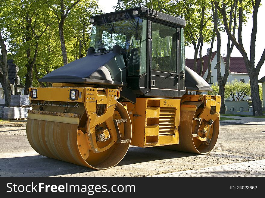 Road roller on a street in PÃ¤rnu, Estonia