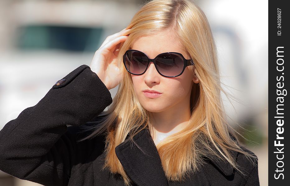 Blonde Teenager In Sunglasses